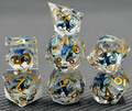 Abyssal Ink clear liquid core RPG dice with dark blue octopus inserts and gold numbers